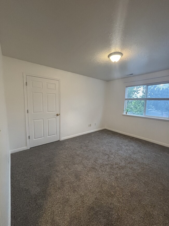 Building Photo - 8083 N Ridge Loop E