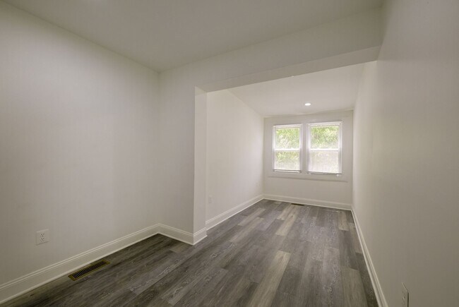 Building Photo - Charming & Renovated Petworth Rowhouse with Parking -  Available Now!