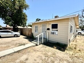 Building Photo - Step into your new residence, a charming h...