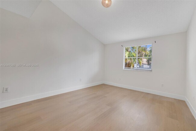 Building Photo - 9820 NW 24th Ct