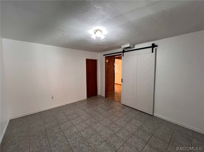 Building Photo - 7660 W Tropical Ln