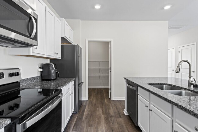 Building Photo - The Preserve at Tidewater | Community Pool, Trails & Coastal Living