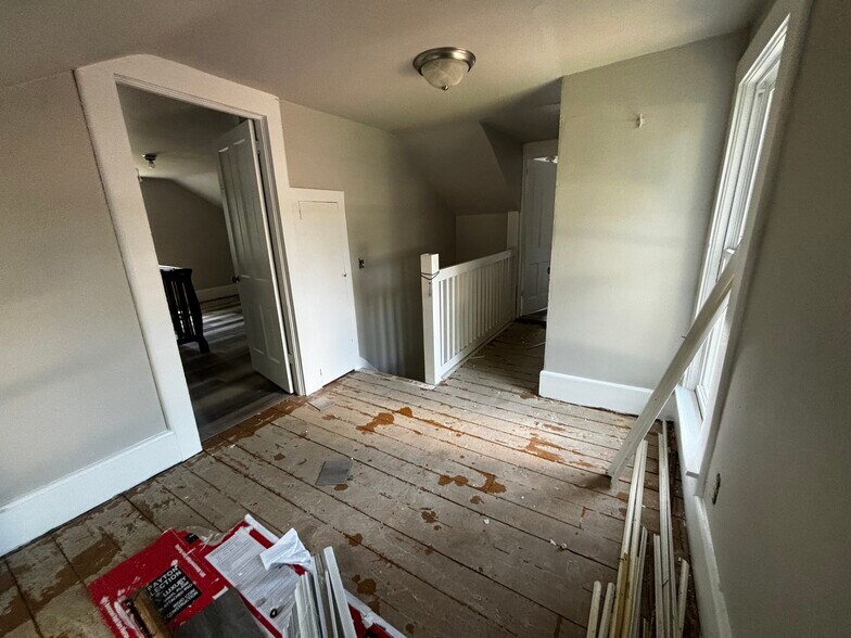 Landing at top of stairs - 420 E 2nd Ave