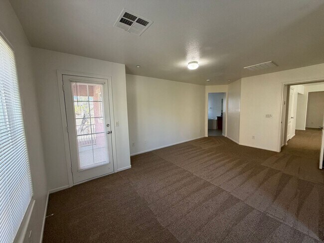 Building Photo - Discover a refreshed 4-bedroom, 2.5-bath home in Las Vegas 89149