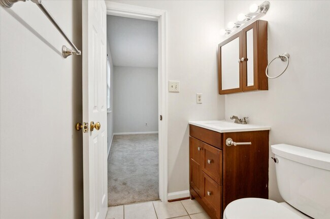 The primary bedroom offers - 1644 Skiffes Creek Cir