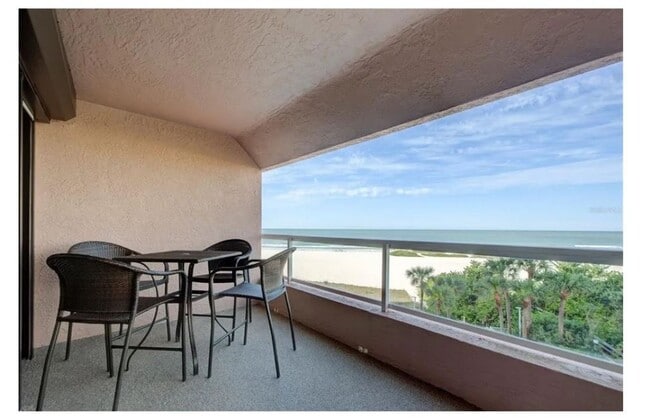 Building Photo - Newly Renovated Beachfront Condo with Stun...
