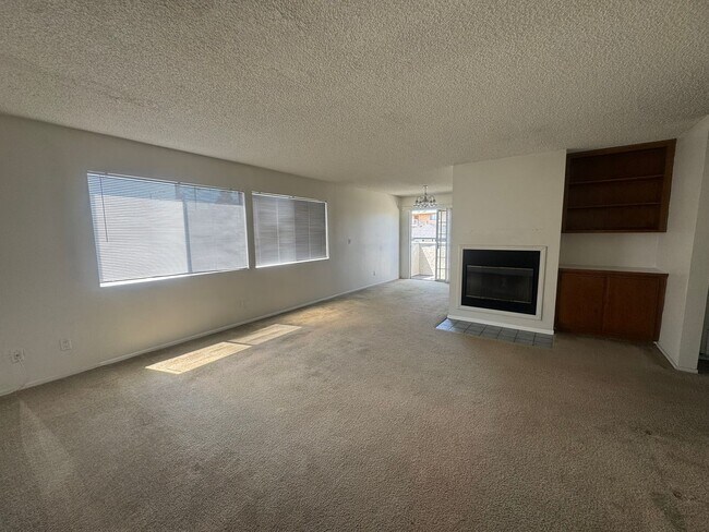 Building Photo - $2,395! Spacious Upstairs 2 Bedroom, 2 Bathroom Apartment with 2-Car Garage! 90710
