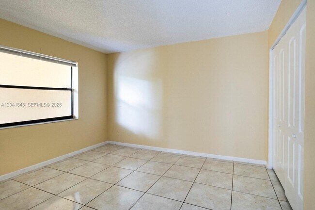 Building Photo - 9044 NW 28th Dr