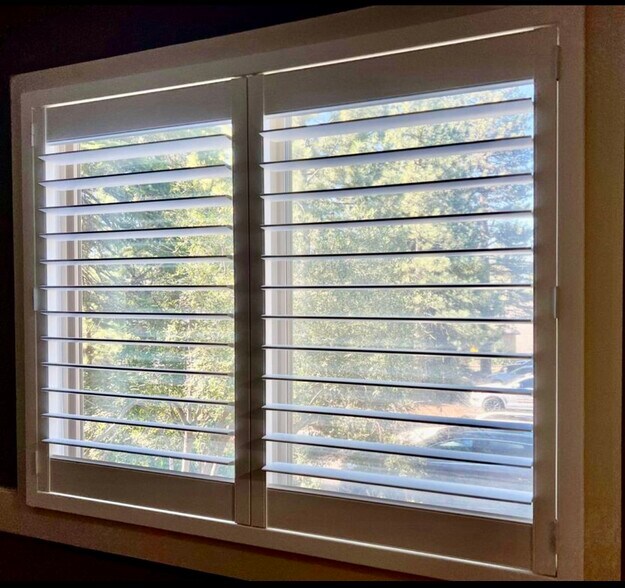 Plantation shutters in bedroom. - 872 Tanager St