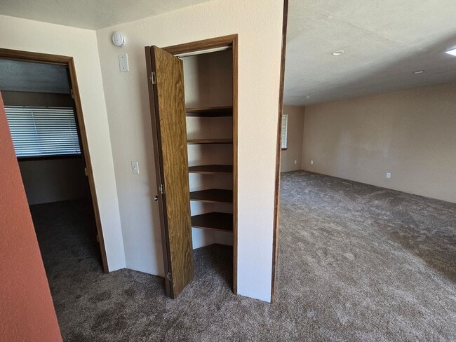 Building Photo - READY NOW. Huge backyard, lovely two bedro...