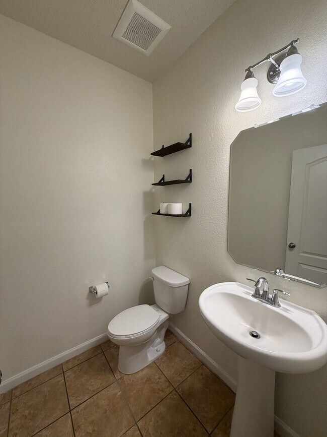 Building Photo - 4 Bedroom + Office Home Available Near Loma Colorado Blvd NE & Broadmoor Blvd NE in Rio Rancho!