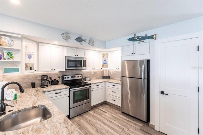 Building Photo - 6154 Midnight Pass Rd