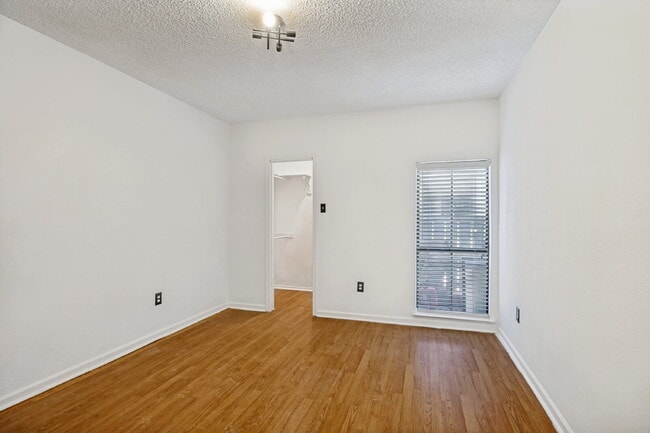 Building Photo - Spacious Dallas Condo with Unbeatable Storage, Private Patio & Carport