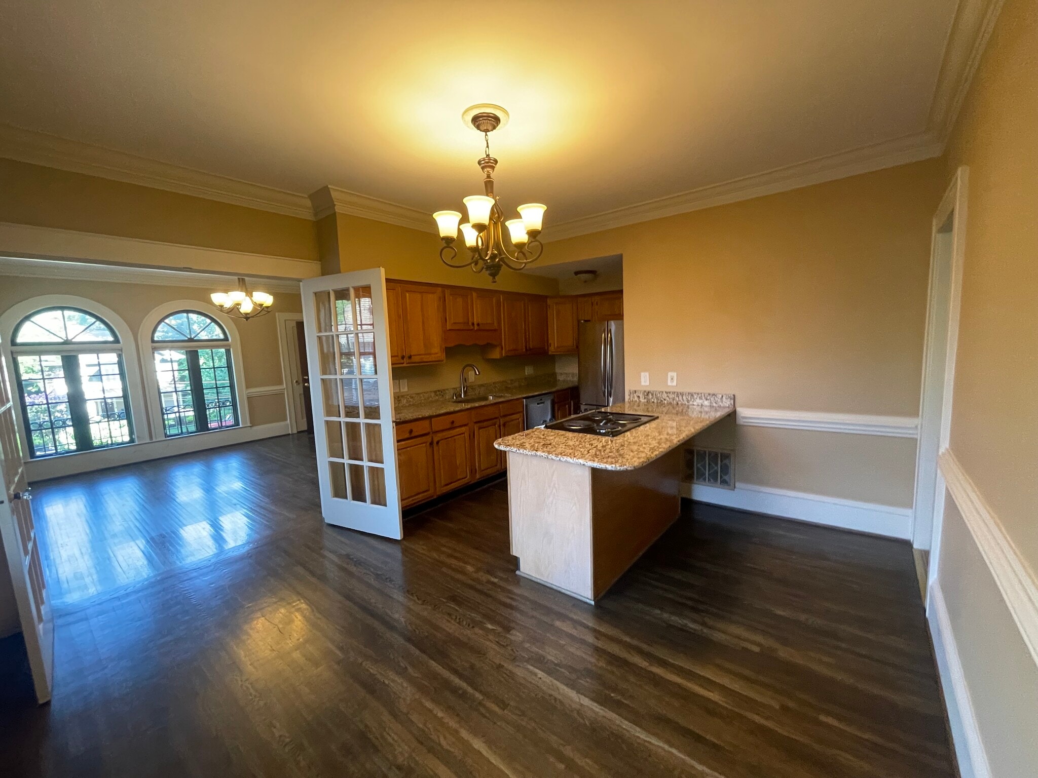 french doors lead in to dining room with granite - 418 Clement Ave