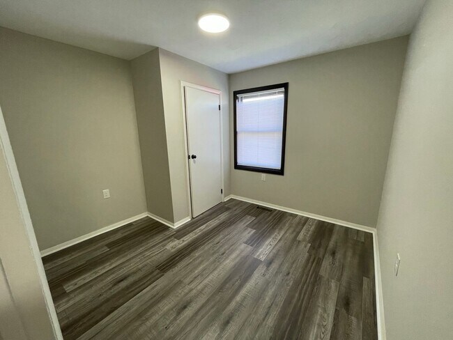 Building Photo - Oversized 3 Bedroom with laundry room!