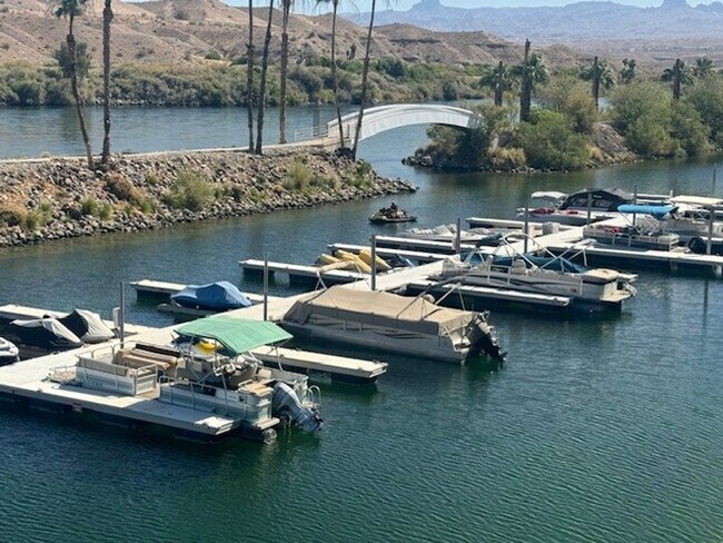 Building Photo - Riverfront 2BR 2BA Furnished Condo on GROUND LEVEL W/Garage and UTILITIES Included AVAIL 4/1/26