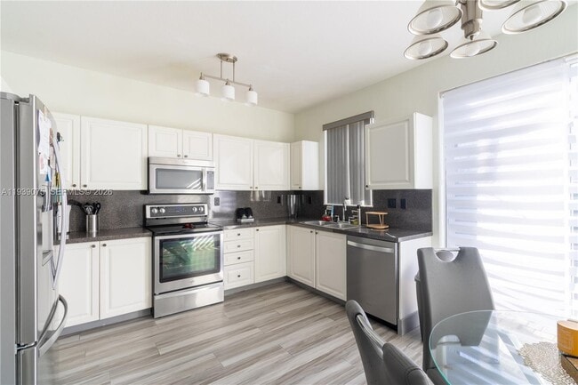 Building Photo - 5580 NW 107th Ave