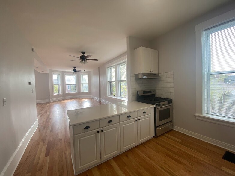 kitchen into dining room and living room - 4200 N Damen Ave