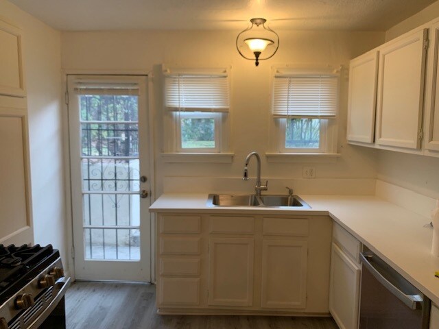 Kitchen facing the second exterior door. - 24606 University Ave