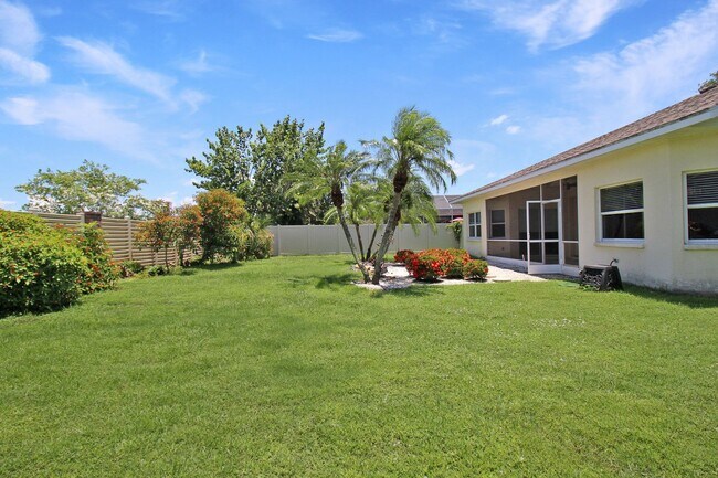 Building Photo - Annual rental: Spacious 3BR/2BA Creekwood Home with Office, Screened Lanai, EV Charger & Resort-S...