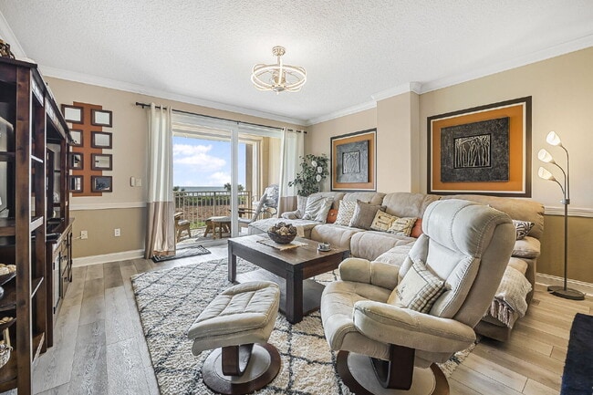 Building Photo - Available for a 7-12 month lease, Unit 208 has a beautiful oceanfront setting.