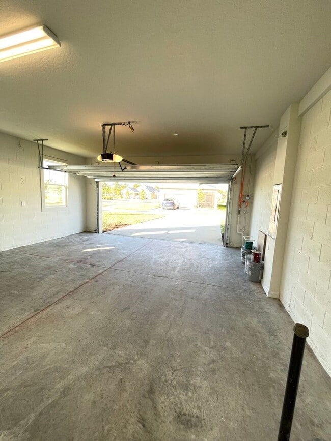 Building Photo - Newly Built, Water View, Luxury Executive 3 BR Lake Nona area corner townhome with an exclusive l...