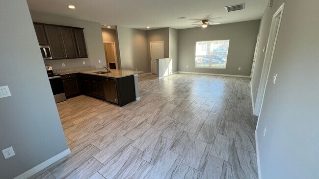 Building Photo - Beautiful 3 Bedroom Palm Bay Home with Upgrades & No Water Bill!