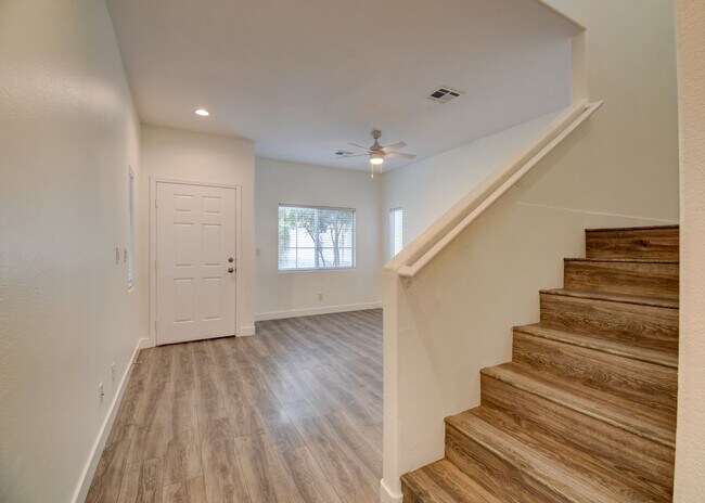 Building Photo - Great home with 4 bedrooms, 2.5 baths. New Floors Paint and Countertops.