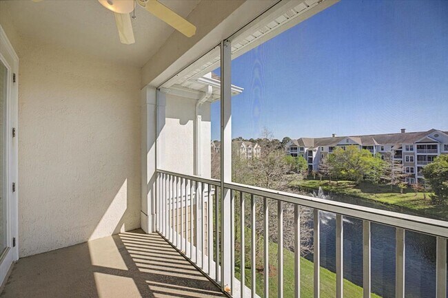 Building Photo - Peaceful Pond Views + Open Layout | 2BR + Office in Prime Location