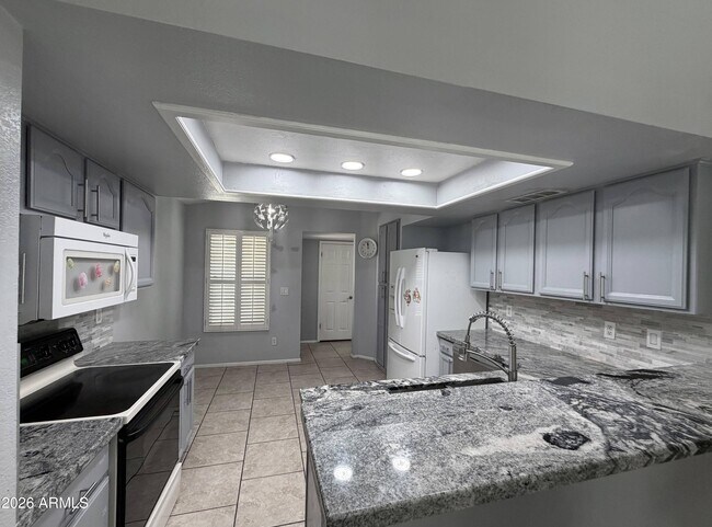 Building Photo - 11815 N 65th Dr
