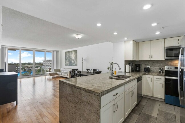 Building Photo - 5599 Collins Ave
