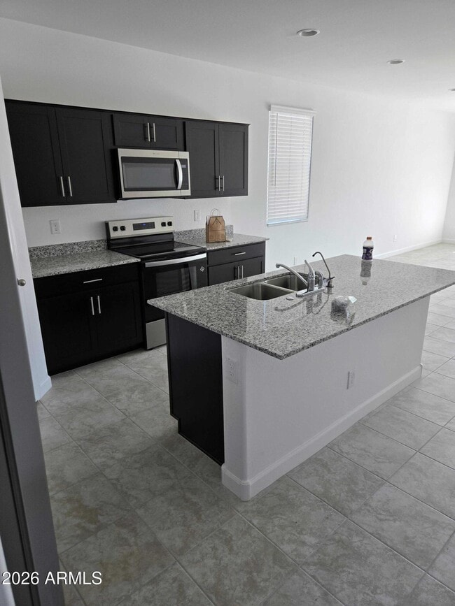 Building Photo - 5447 E Axle Ave