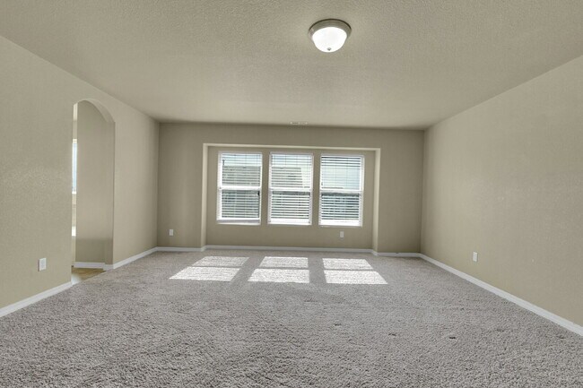 Building Photo - $2,490.95 - 4 Bed, 2.5 Bath Home in CO Springs with Fenced in Yard and 3 Car Garage!