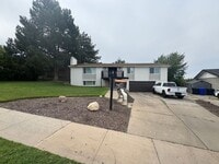 Building Photo - 5 bdrm 3 bth Home 2 Car Garage