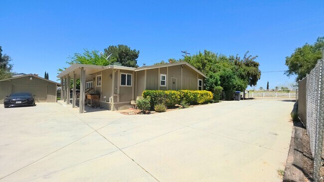 Building Photo - 4bed 2bath 3 car garage and Rv Boat Parking- Gorgeous Single Story House
