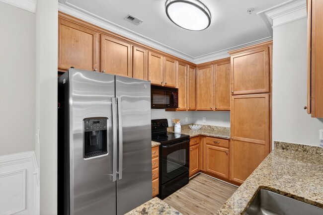 Building Photo - Tons of Upgrade! Beautiful 2 Bedroom, 2.5 Bath Condo in Waterford@ Cary Park, Available Now!