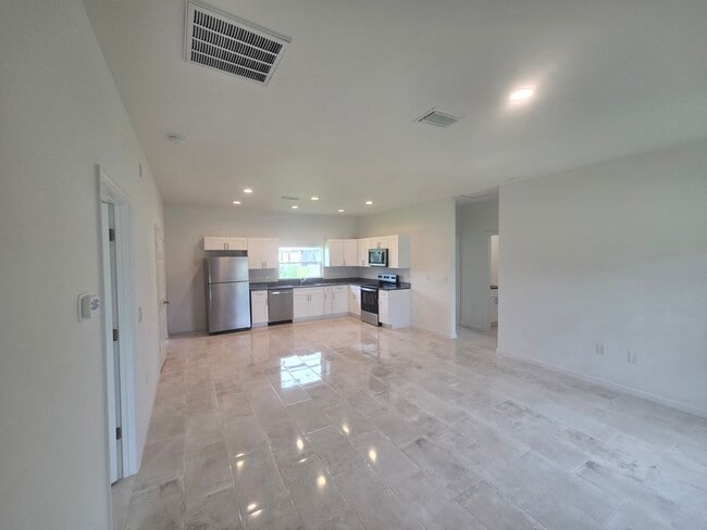 Building Photo - Brand New 3 BEDROOM 2 BATH AND ONE CAR GAR...