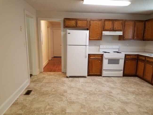 Kitchen & hall view. - 115 N Warren St