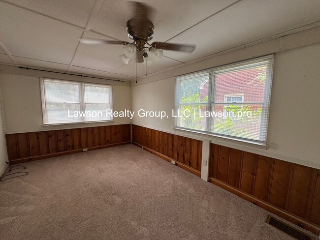 Building Photo - Charming and Updated Home in Raleigh Court with Fenced In Yard, Lawn Care Included!