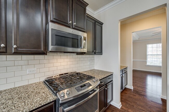 Building Photo - "Spacious 4-Bedroom Retreat with 3 Full Ba...