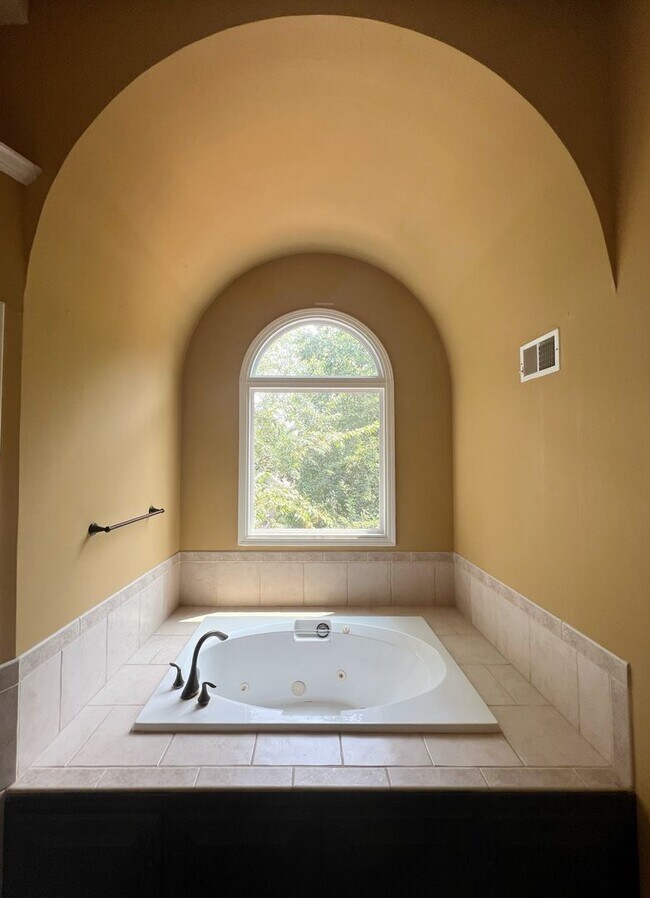 Building Photo - SEE IT NOW: Spacious 4-Bed Home with Finis...