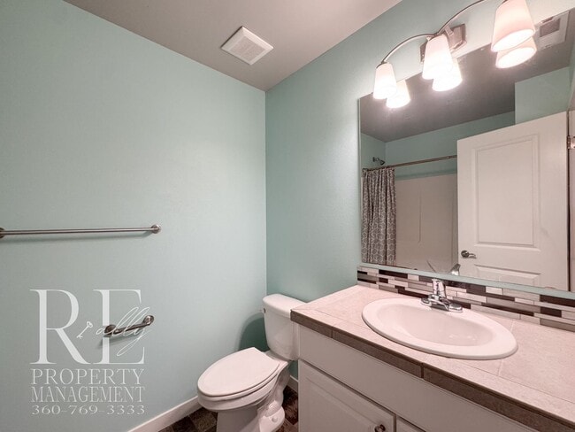 Building Photo - Vaulted Ceilings, Tree-Lined Views & a Spacious Primary Suite Retreat