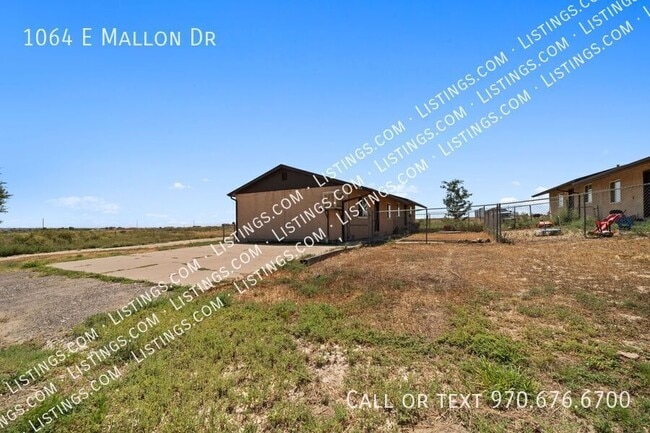 Building Photo - 1064 E Mallon Dr
