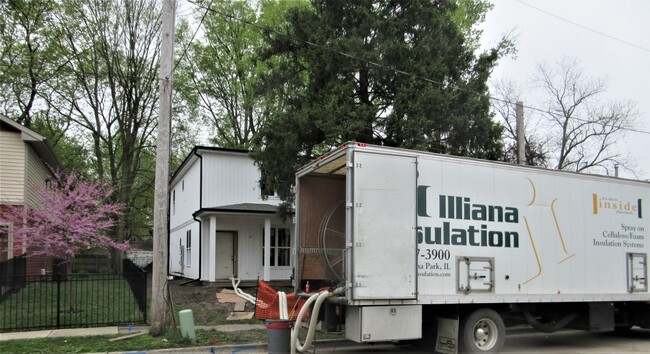 truck blowing in cellulose - 409 W Maple St