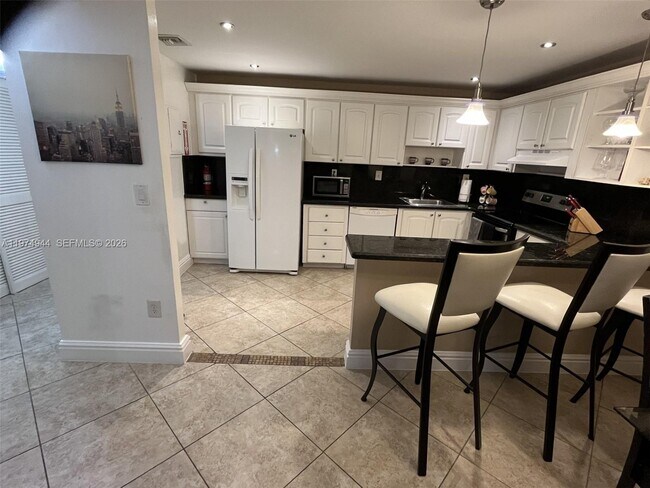 Building Photo - 19370 Collins Ave