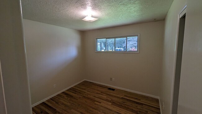 Building Photo - Spacious Three Bedroom with Large Backyard...