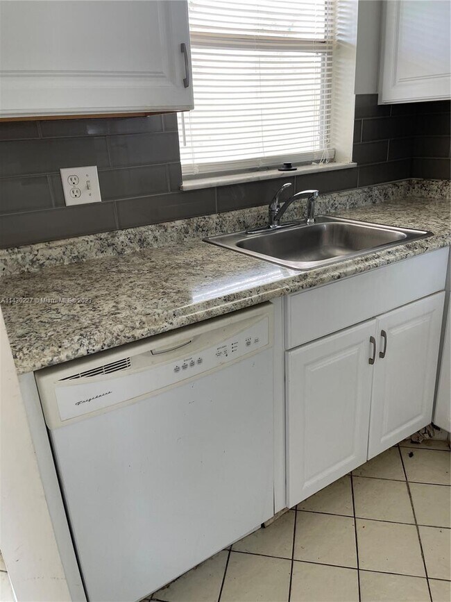 Building Photo - 8285 Sunrise Lakes Blvd