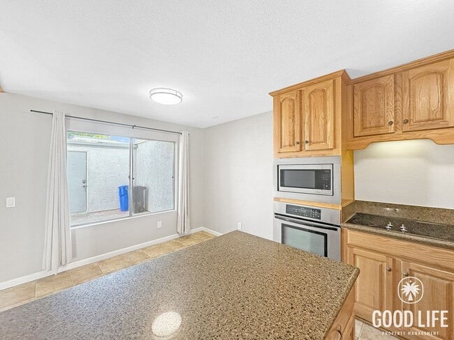 Building Photo - Spacious 3BD/2.5BA Two-Story Condo in Southwest Chula Vista with Kitchen Island, In-Unit Laundry ...