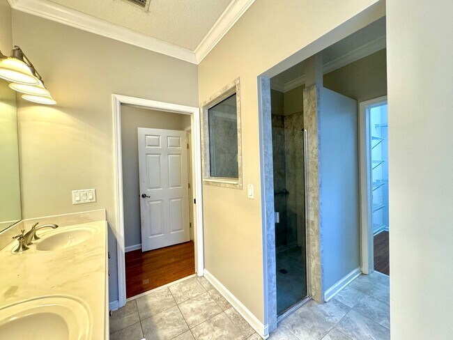 Building Photo - Coastal Charm: Luxurious 4-Bedroom Home in Gated Community Near the Intracoastal