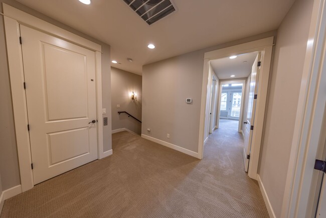 Building Photo - 2 Creeks Condominiums - Gated Community on...